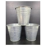 Three small galvanized metal pails
