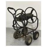 Large rolling metal water hose wagon