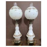 Pair of painted floral hurricane lamps