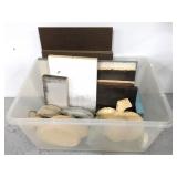 Tote of assorted craft wood and other supplies