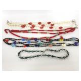 Four assorted beaded necklaces