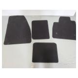 New black carpeted auto floor mats