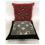 Red and black geometric throw pillows