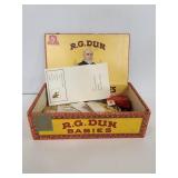 Cigar box of "guy" drawer items
