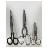 Three vintage metal scissors