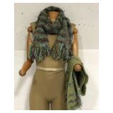 Two green, purple, and blue knit scarves