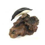 Burl wood dolphin sculpture