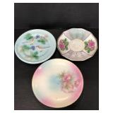 Three pretty ceramic decorative China plates
