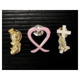 Three vintage pins