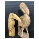 Two vintage wood carved pelicans
