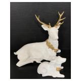 Dad and baby porcelain reindeer figures
