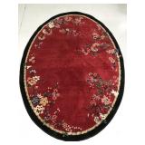 Large oval red & black floral area rug