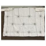 White and gray embroidered tablecloth and napkins