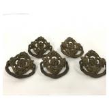 Five ornate embossed metal single drawer pulls