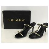 Pair of gold studded black Liliana heels