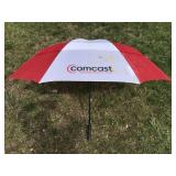 Red and white Comcast umbrella