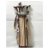 Vintage Wilson golf bag and assorted golf clubs