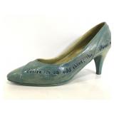 Signed ceramic shoe quote figure