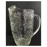 Embossed floral glass pitcher