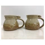 Two Red Duck pottery mugs