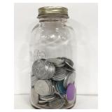 Jar of Mardi- Gras assorted tokens- mostly 1980s