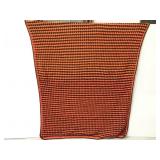 Orange and brown crocheted throw blanket