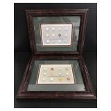 Two framed golf ball diagram art