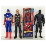 Four Marvel Super Hero figurines- one in box