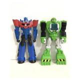 Two large Transformers action figures