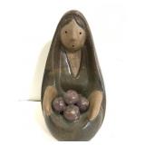 Clay sculpture of a lady