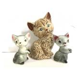 Three ceramic cat figurines