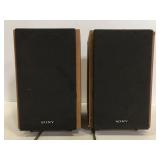 Two small Sony speakers