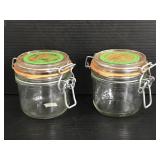 Pair of glass honey containers