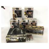 Walking Dead Funkos, playing cards, and puzzle