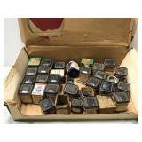 Box of vintage automotive parts