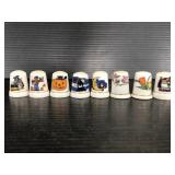 Collection of eight porcelain thimbles