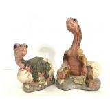 Two hatching dragon figures
