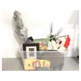 Tote of assorted books and knick knacks