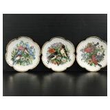 Trio of vintage bird plates with gold trim