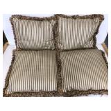 Four gold striped down feather throw pillows