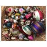 Wicker basket of assorted vintage ornaments