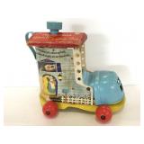 Vintage Fisher-Price music box lacing shoe