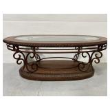 Glass top faux leather rolling oval coffee table