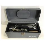 Gray craftsman tool box full of assorted tools