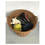Basket full of assorted golf club covers