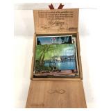 Vintage postcards in wooden cigar box