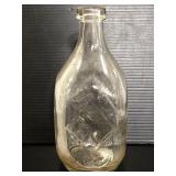 Unique flat sided glass bottle