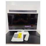 LG model 24LF4520 TV monitor with remote