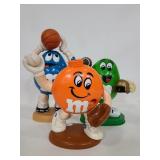 Three vintage sports M&M candy dispensers