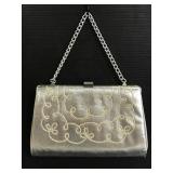 Silver clutch purse with chain strap